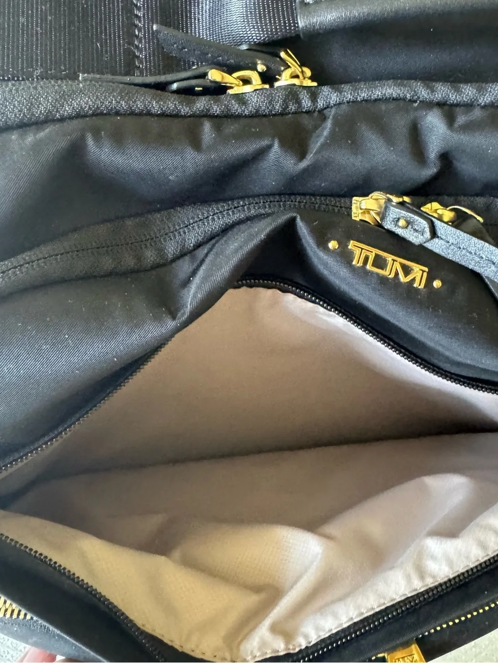 Tumi Black Travel Carry-On with Gold Hardware